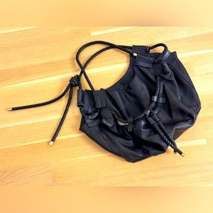 Foley & Corinna genuine black leather drawstring purse